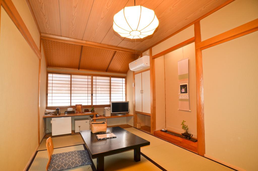 Hotel Kunisaki Unzen Habitación foto